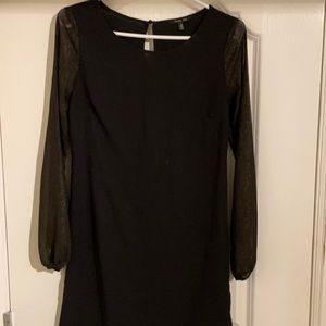 Dress with sheer sleeves